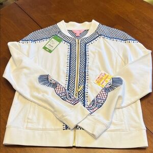 White Jacket with Blue Pattern and Elephant embroidered on lower sleeves.